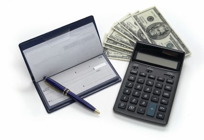 financial analysis; checks, graphs, money, calculator